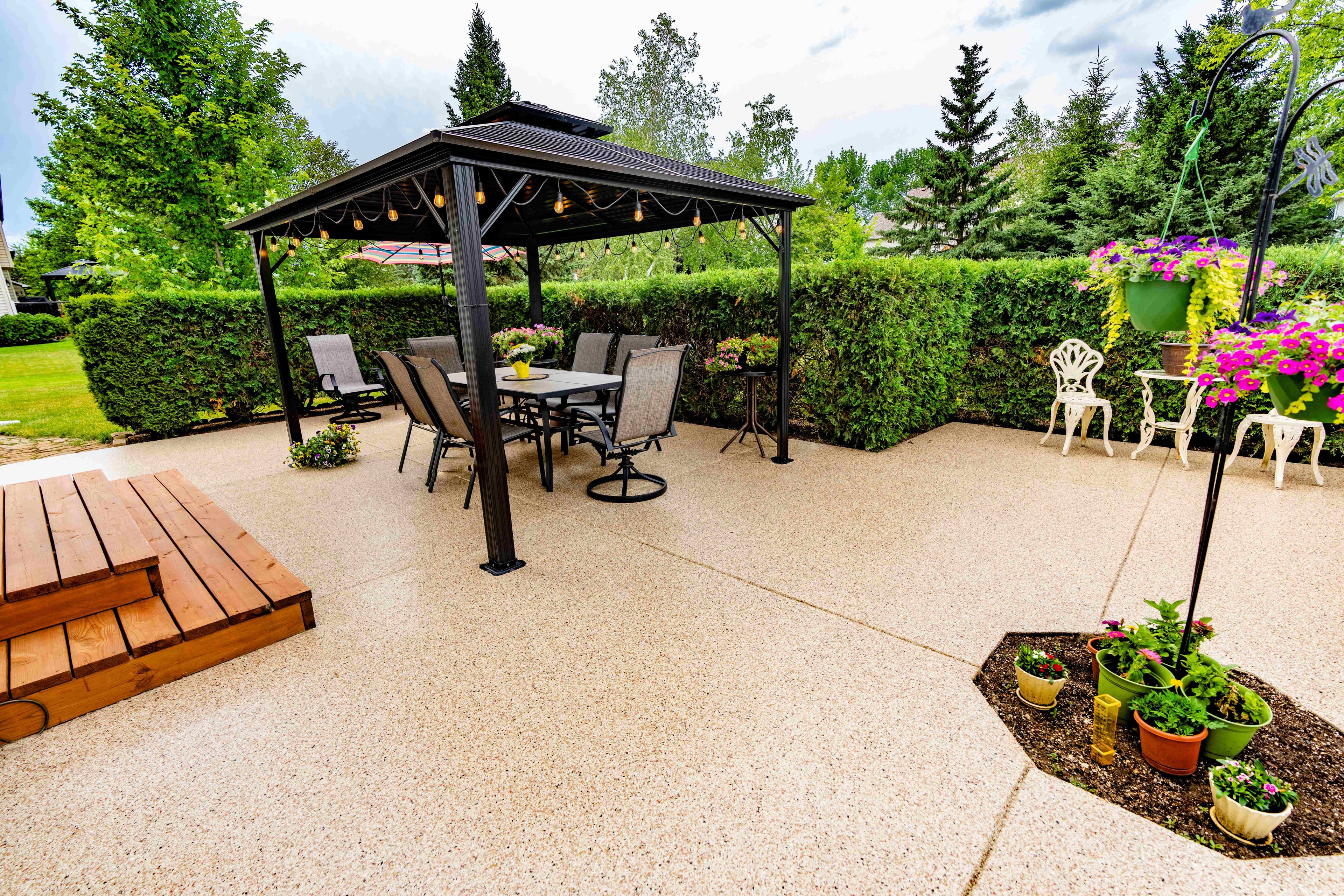 Premium polyurea outdoor patio coating with pecan chip flake finish